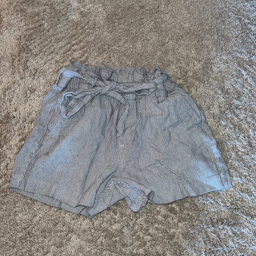 I’m selling blue and white striped paper bag shorts from old navy.